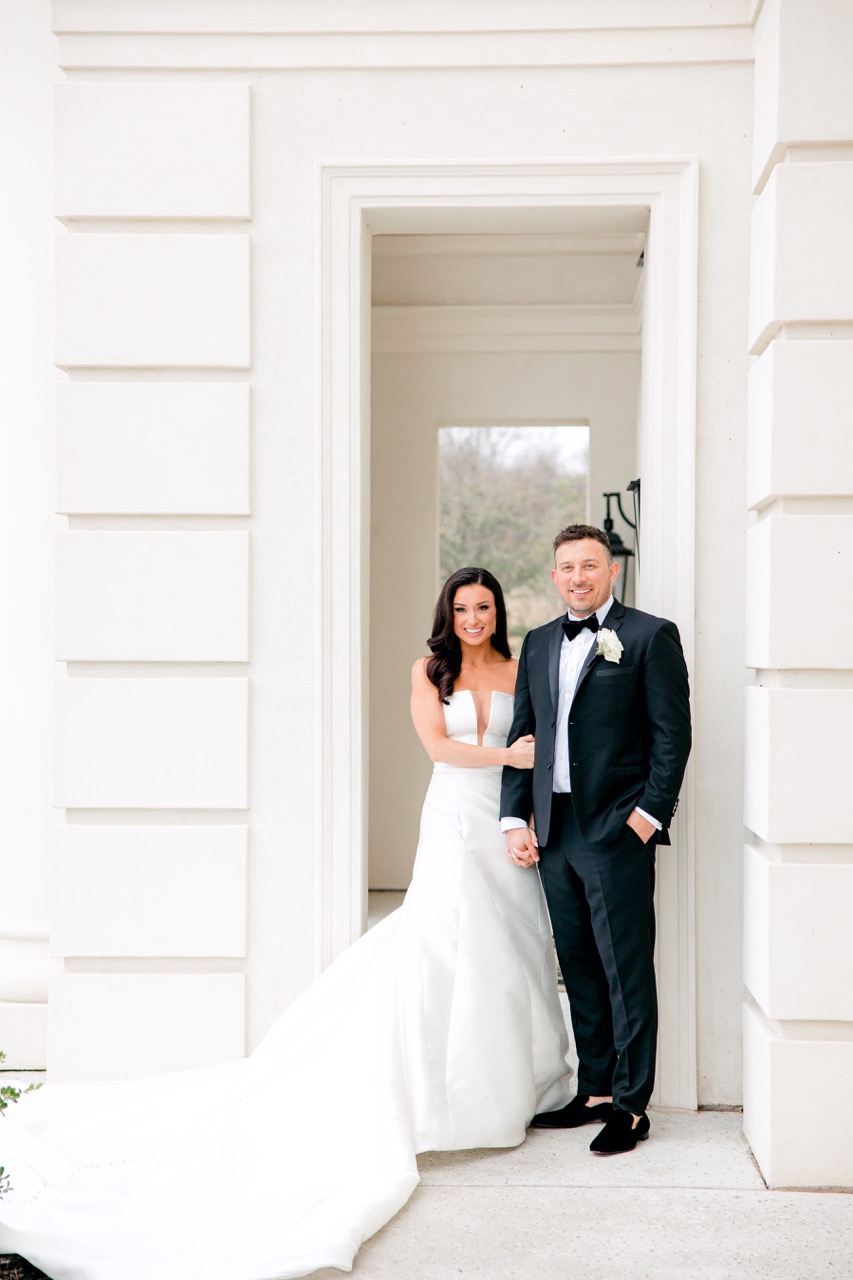 Classic and timeless wedding portrait of bride and groom newlyweds.